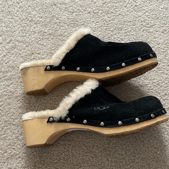 fur lined wooden clogs